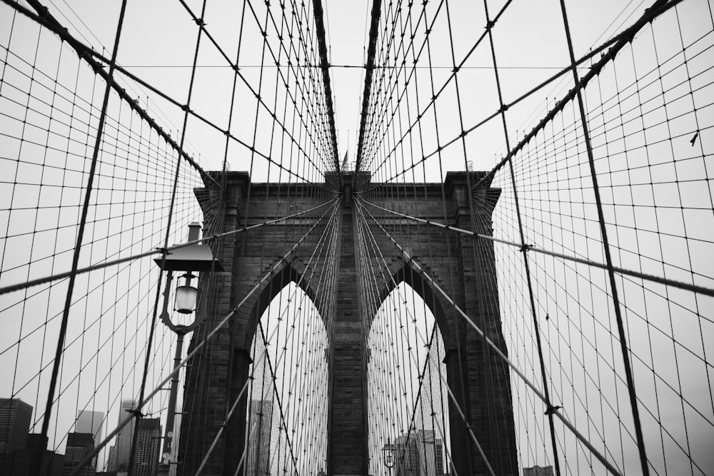 grayscale photo of brooklyn bridge