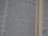 A close-up view of an open book with text focusing on biblical scripture. The text is printed in two columns on a thin, slightly yellowed page, indicating an older or traditional style publication. The lighting highlights parts of the text while leaving other areas slightly shadowed.