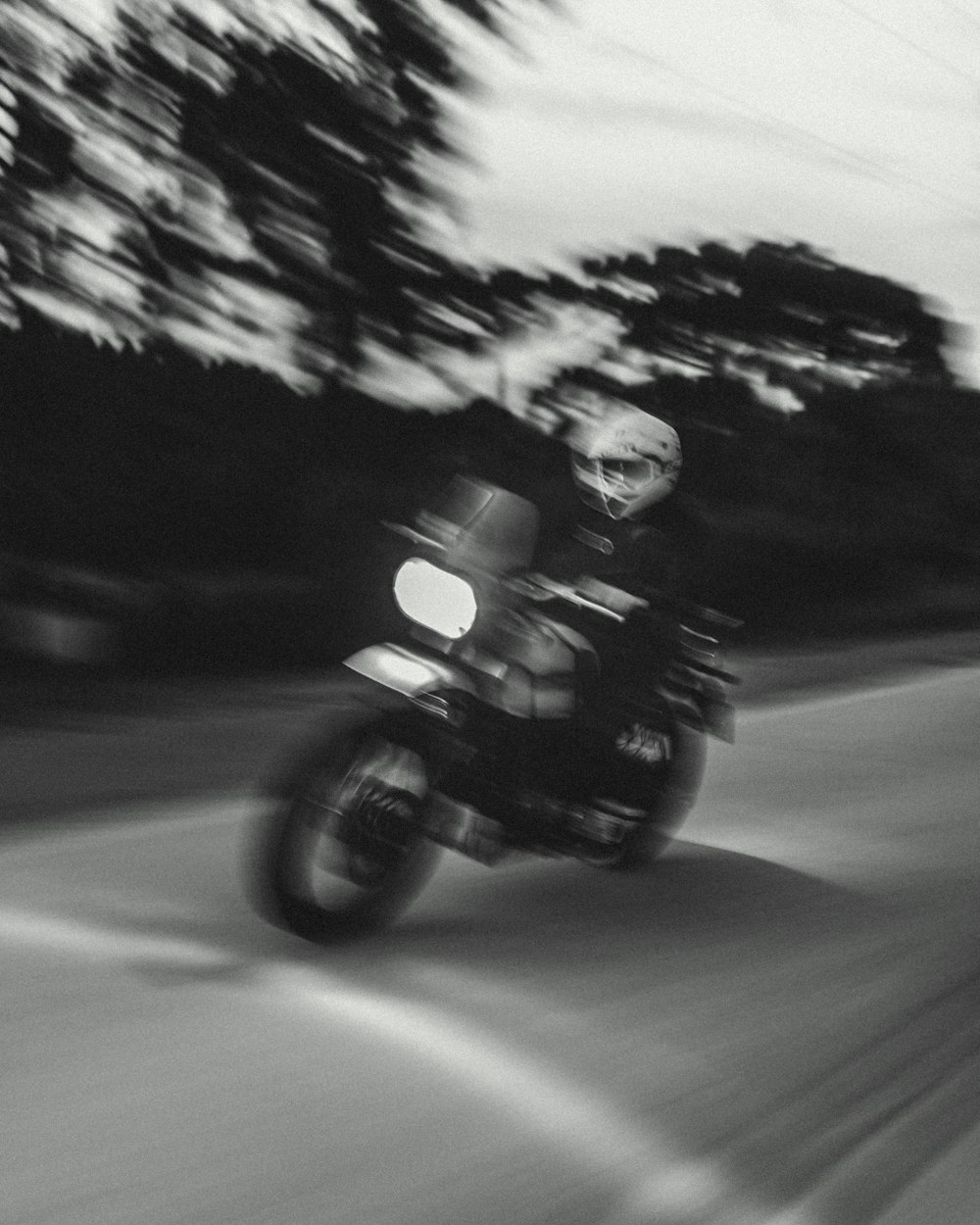 man riding motorcycle on road during daytime