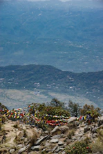 A happy traveler enjoying a scenic view of the Himalayas near Sikkim.