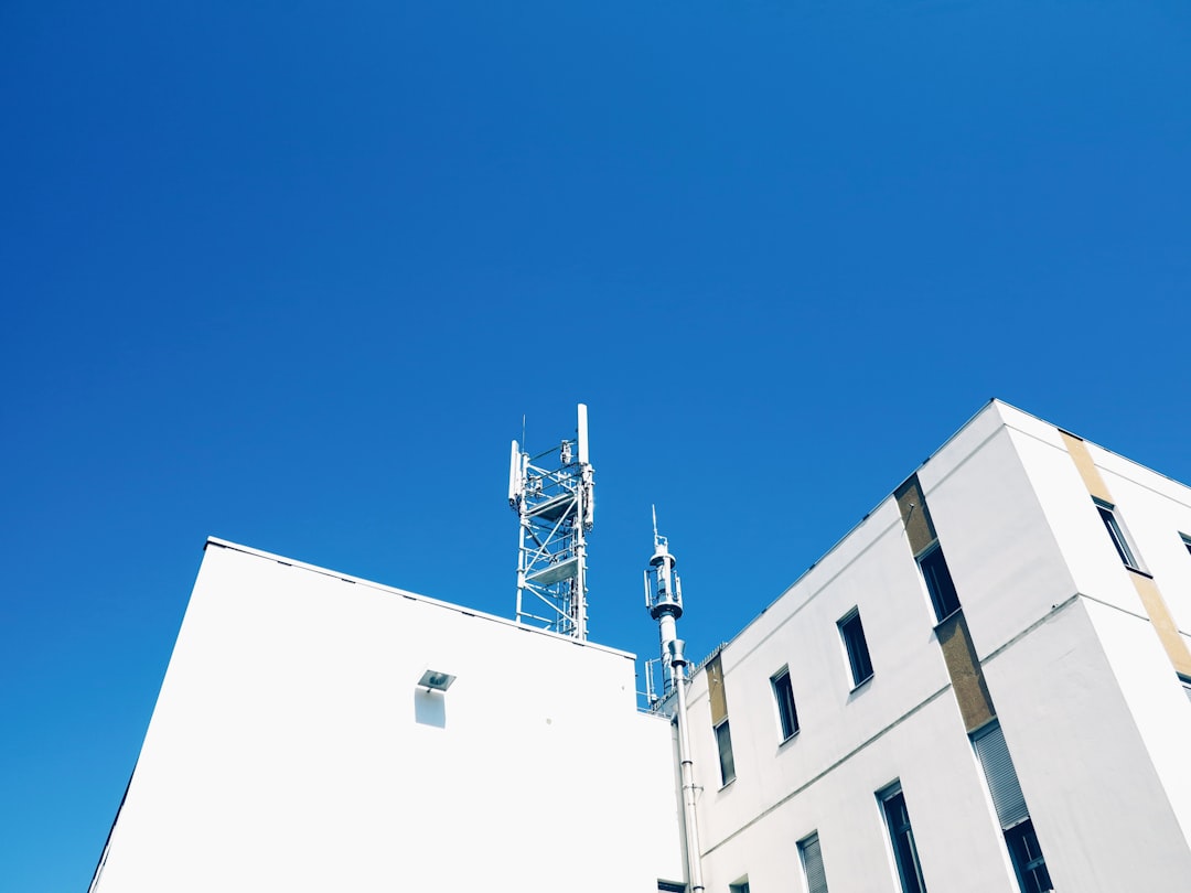 white concrete building under blue sky during daytime