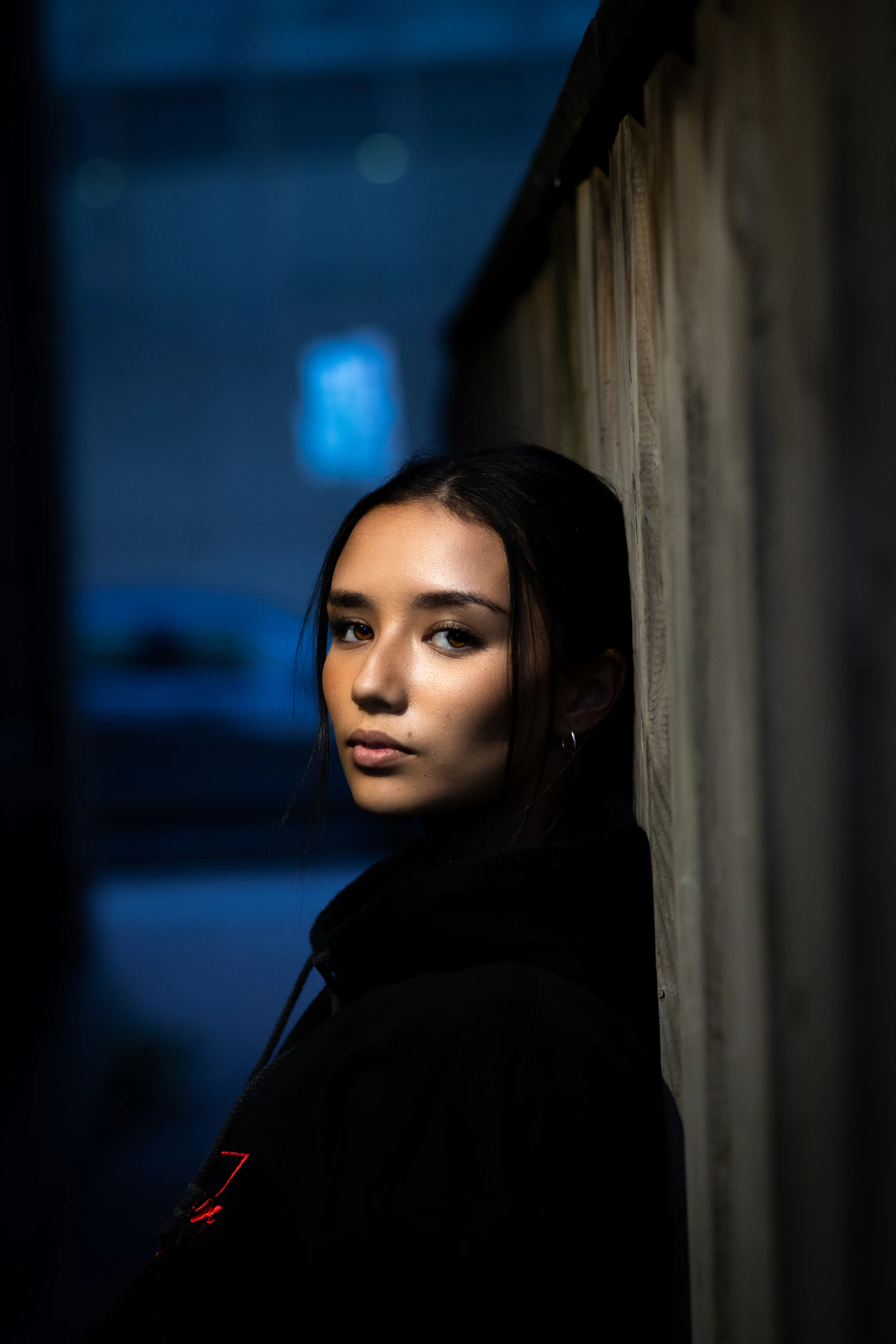 Black hoodie streetwear portrait photographed at night in Toronto