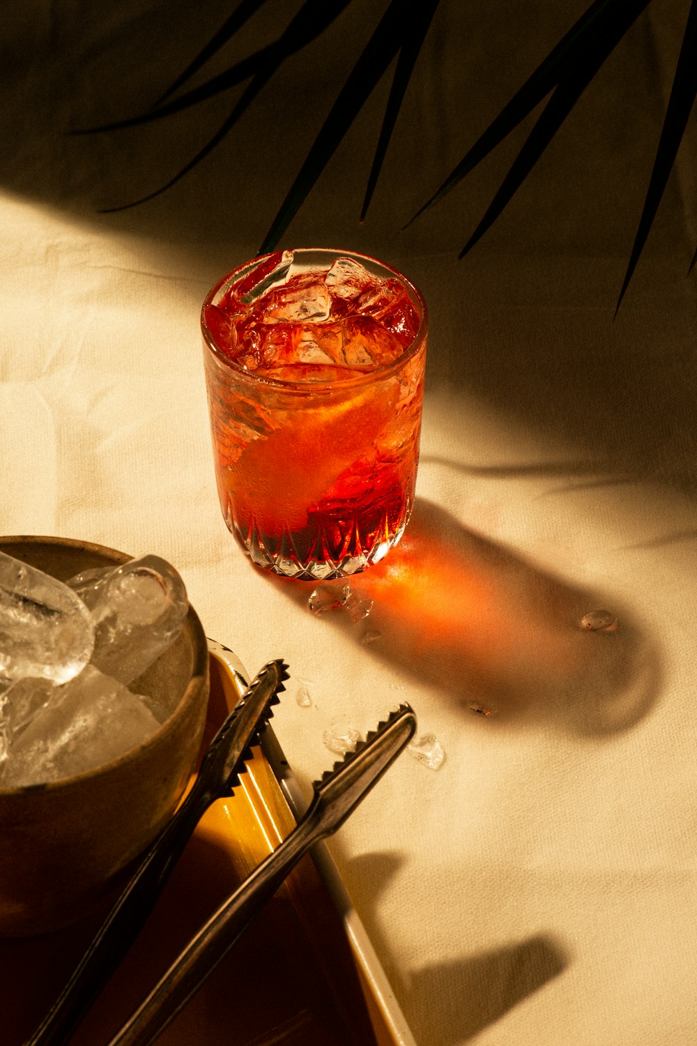 clear drinking glass with red liquid