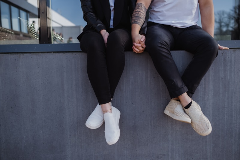 Elegant gay man relaxed in monochrome