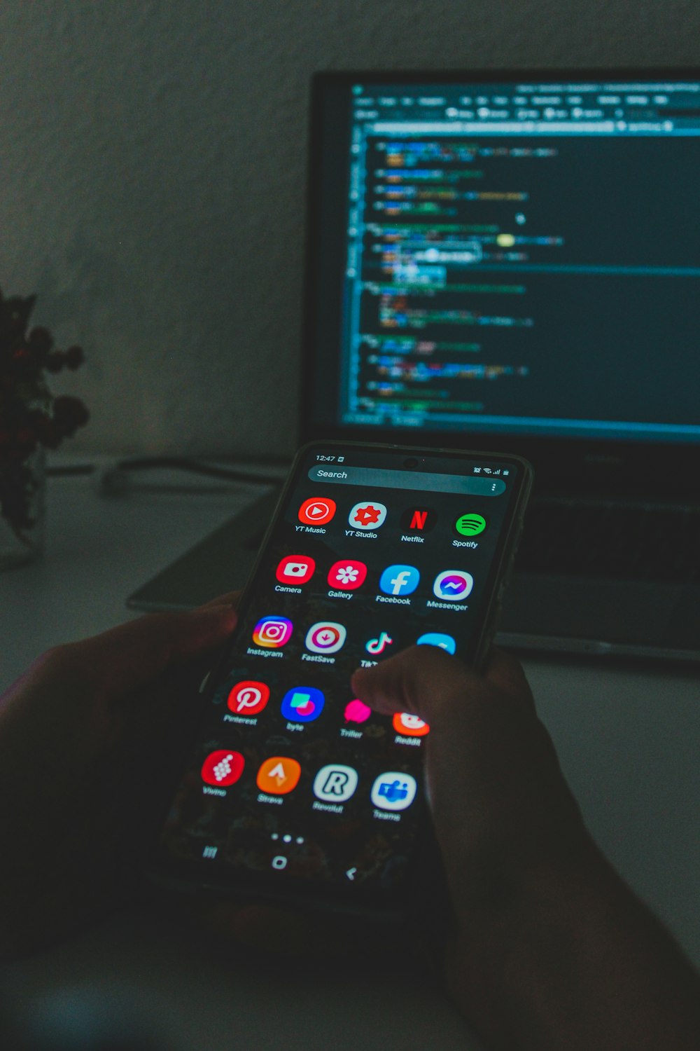 person holding black android smartphone