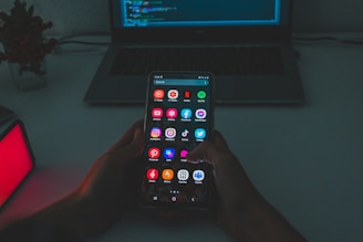 black android smartphone turned on displaying icons