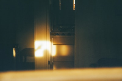 Natural light streaming into the cozy, feminine home studio space.