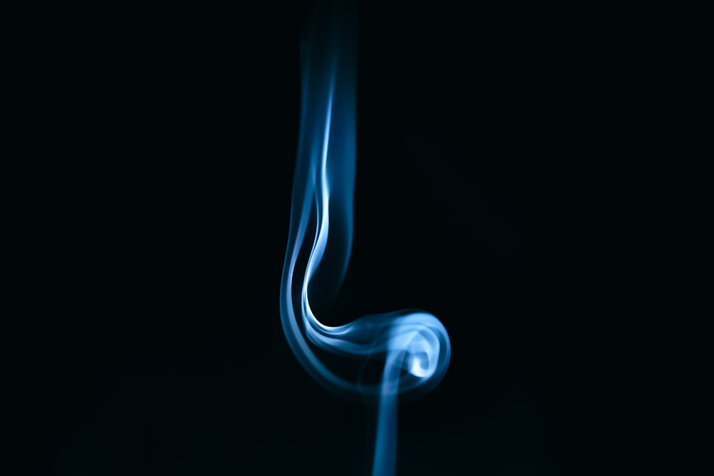 white smoke in black background