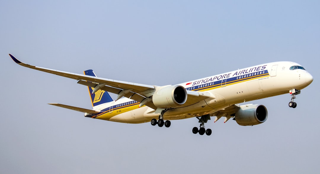 white and blue passenger plane in mid air during daytime, Beautiful Singapore Airlines Airbus A350-900 Arriving From Singapore To Dhaka.<p></figure>9V-SMO || Airbus A350-900 || Singapore Airlines || 116.</p><p>