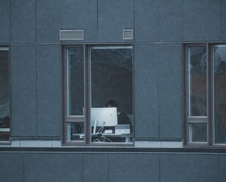 white wooden framed glass window