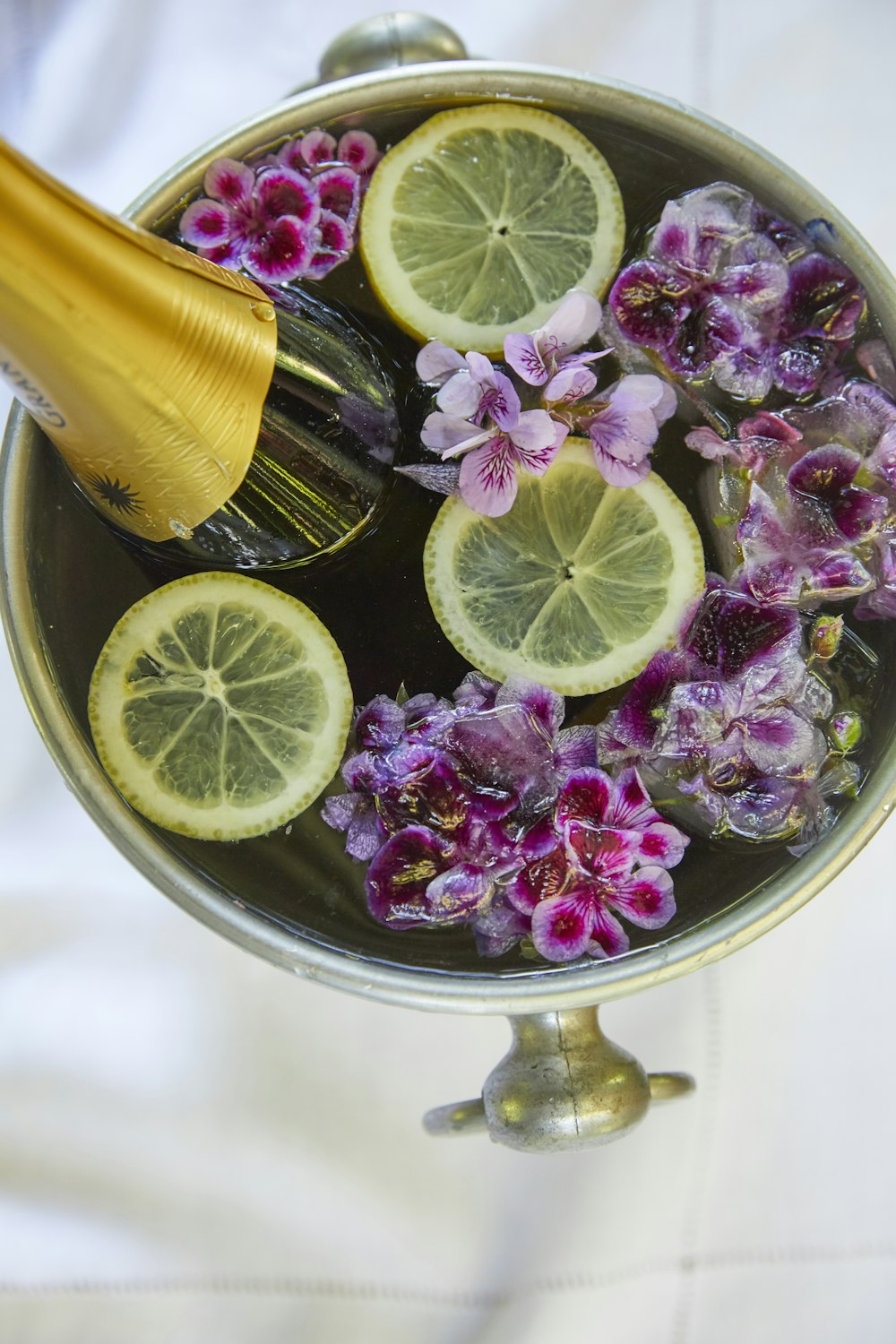 sliced lemon on clear glass bowl