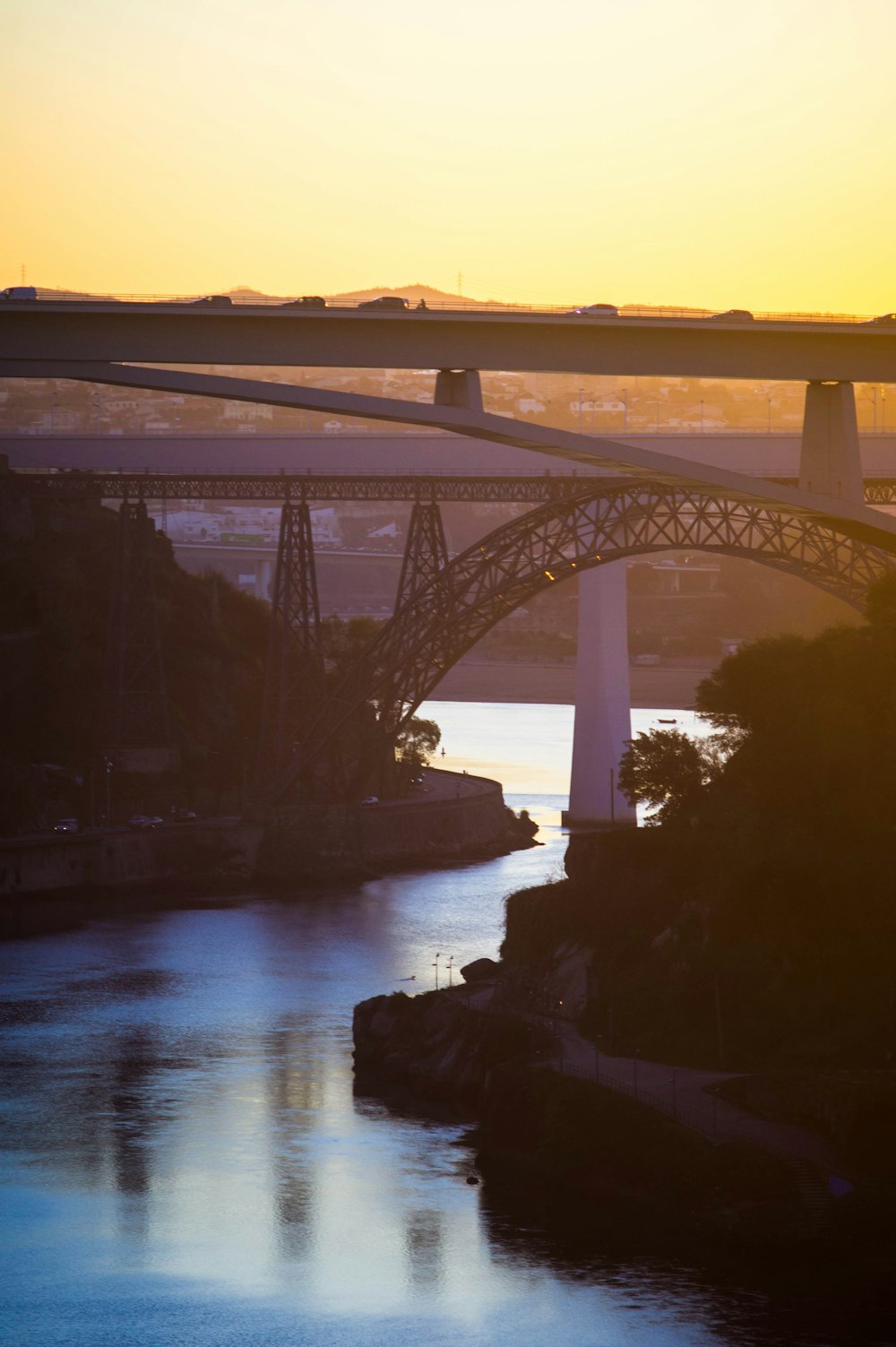 white bridge over river during daytime