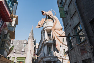 A whimsical fantasy scene featuring dragons and castles in line art style.