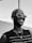 grayscale photo of woman in tank top wearing sunglasses