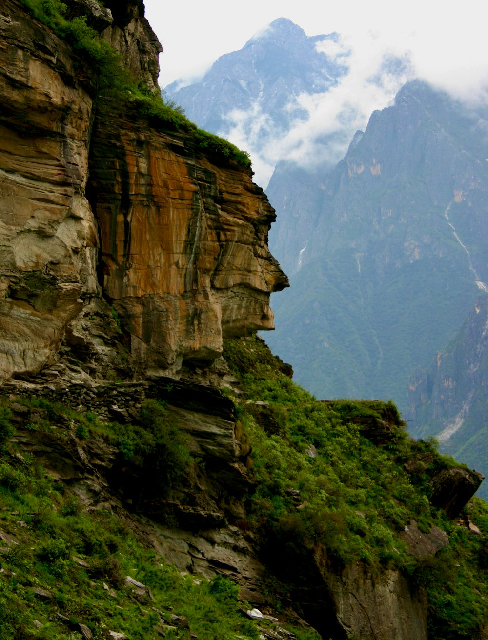 brown rocky mountain under blue sky during daytime