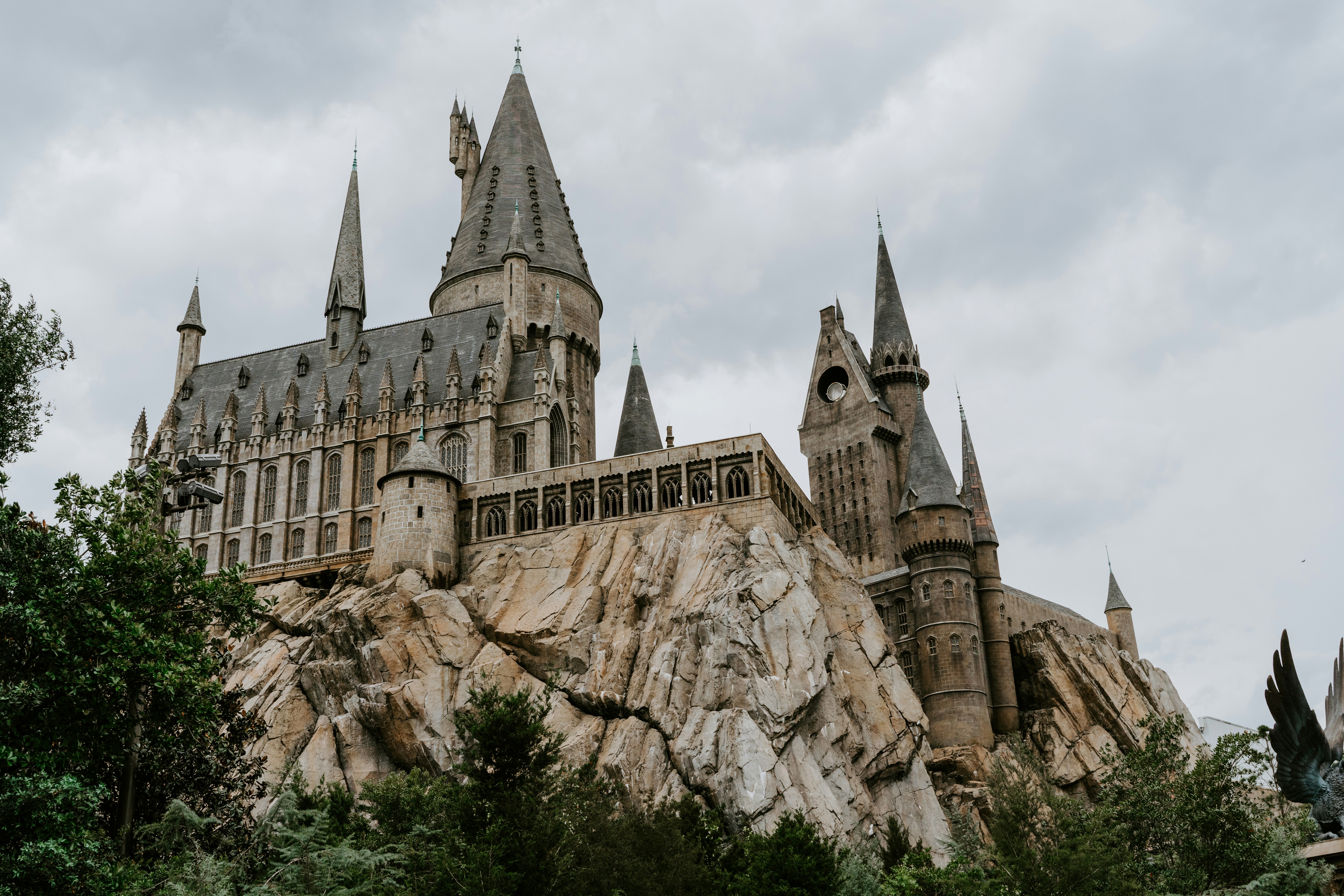 brown concrete castle under white clouds during daytime