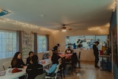 A cozy dining area where residents enjoy meals together.