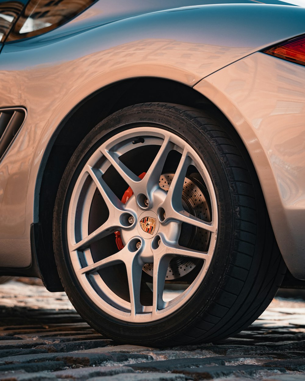 silver mercedes benz wheel with tire