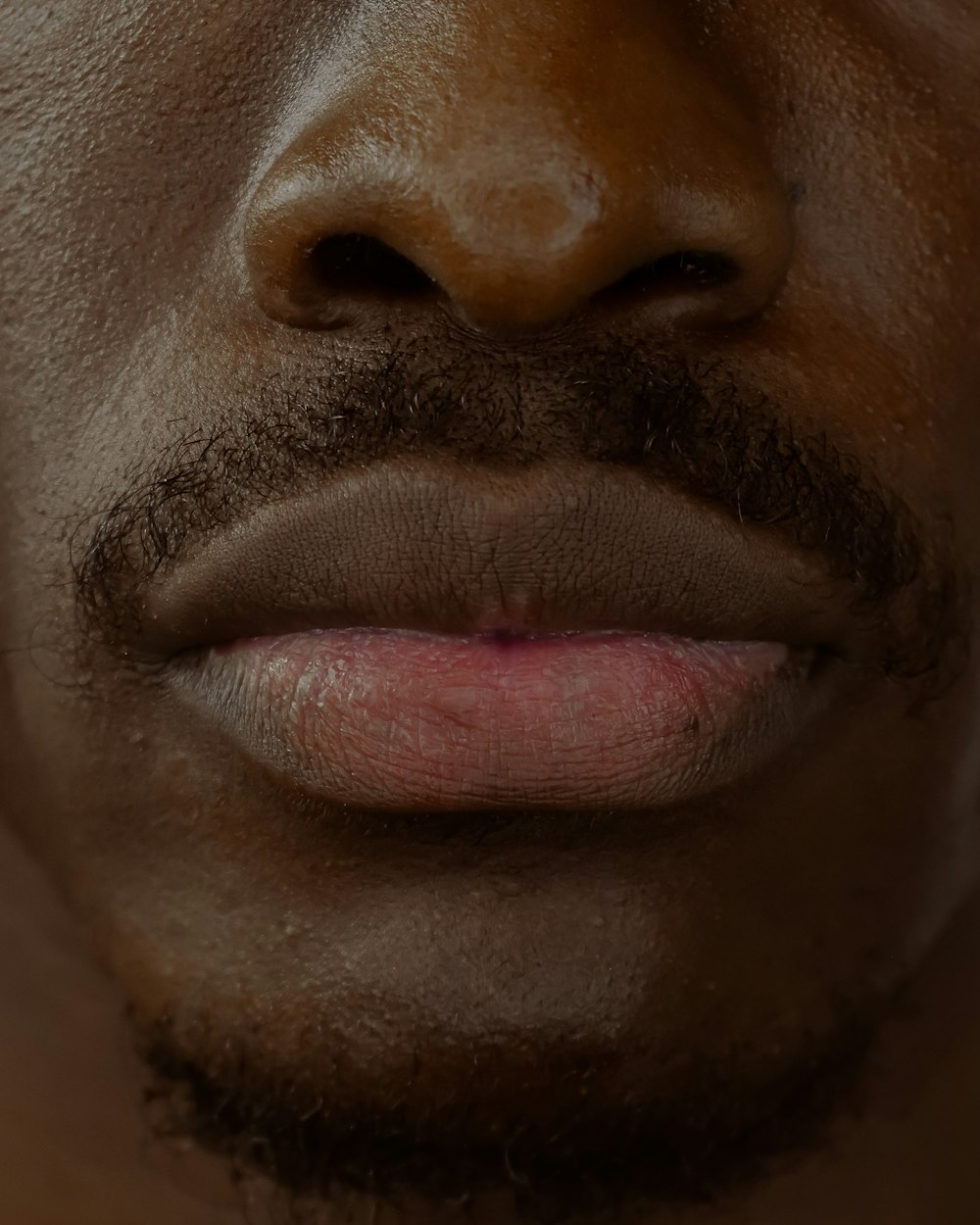 Männergesicht mit Schnurrbart