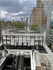 Window view showing nearby shopping mall and city life