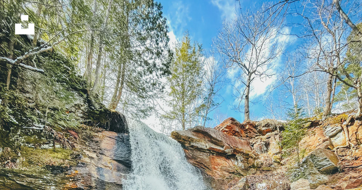 Water falls on rocky shore during daytime photo – Free Spring Image on ...