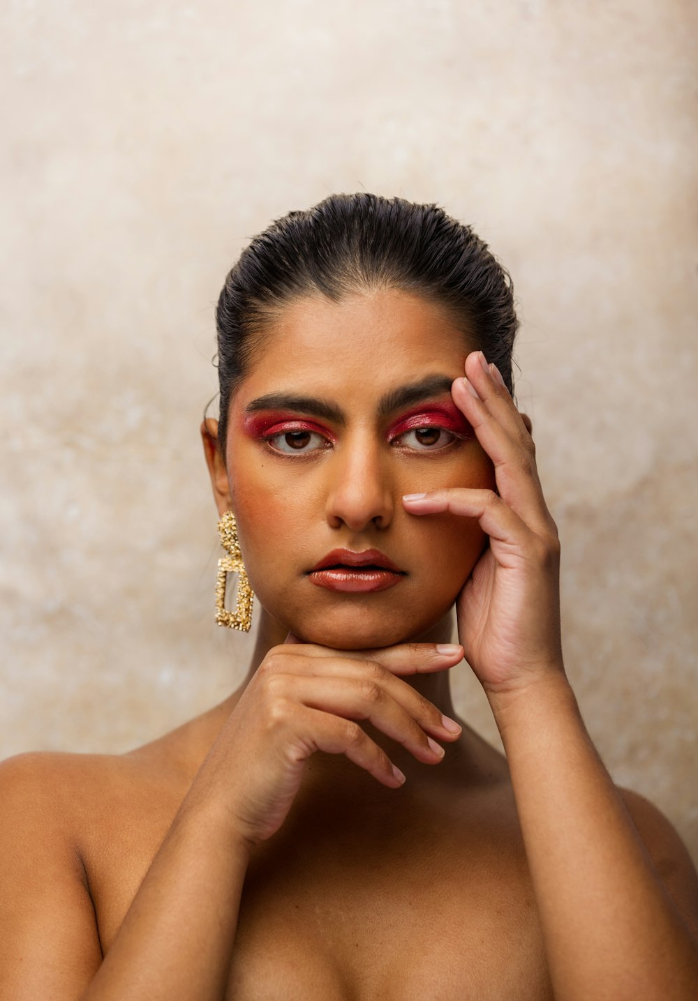 woman with gold ring on her left hand