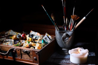paint brushes in stainless steel bucket