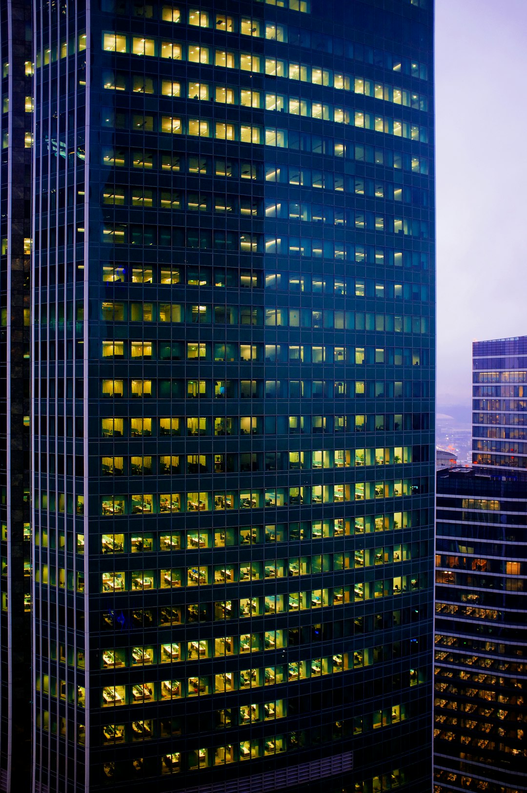 green and yellow high rise building