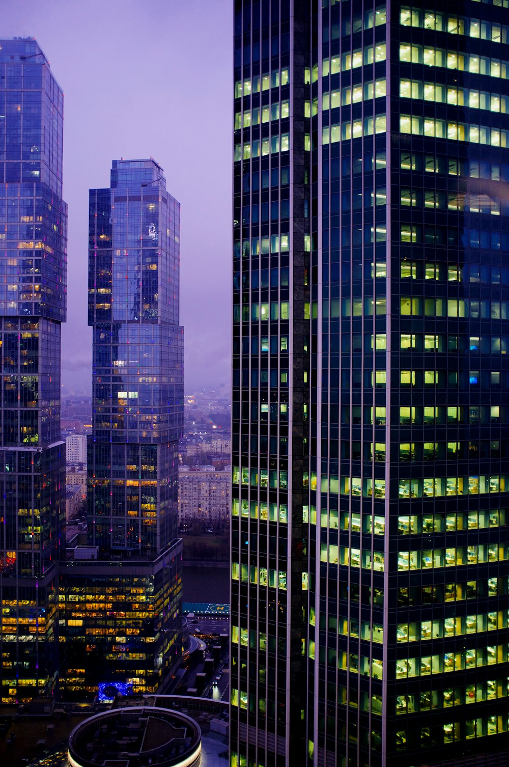 green and black high rise buildings