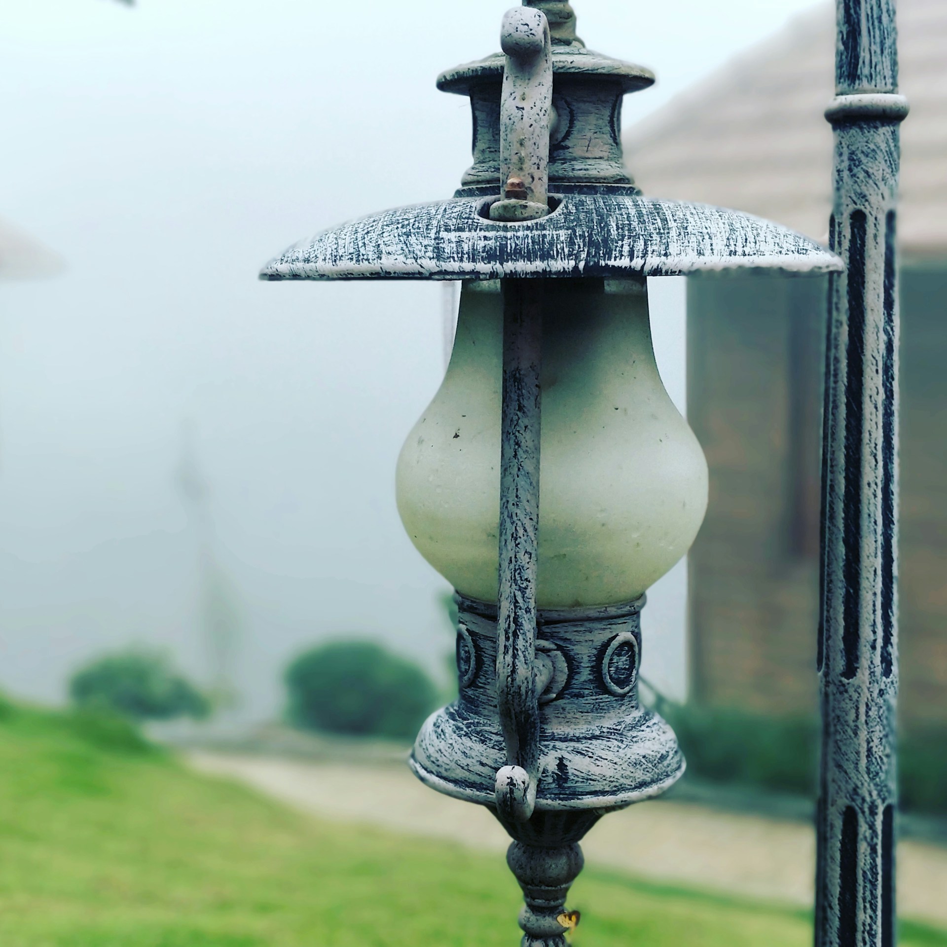woman wearing yellow long-sleeved dress under white clouds and blue sky during daytime