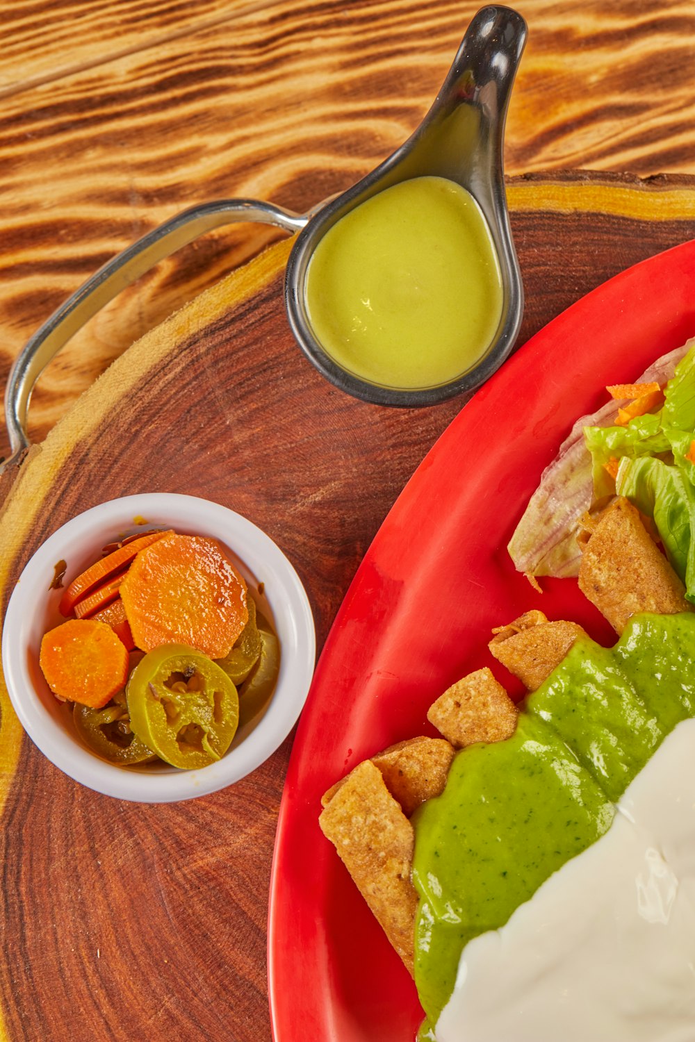 green vegetable on red ceramic plate