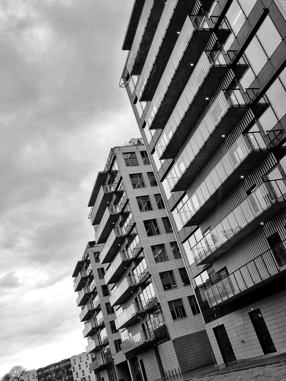 grayscale photo of high rise building