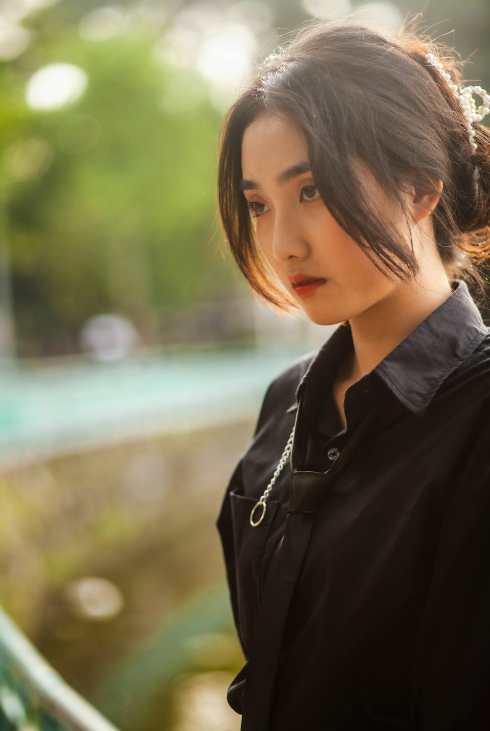 woman in black collared shirt