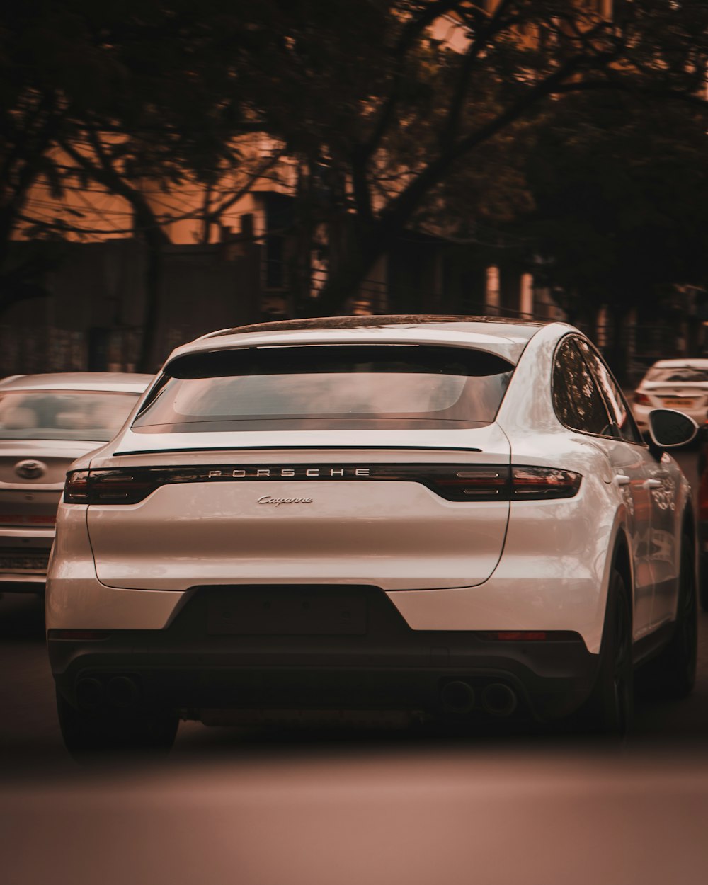 white car on road during daytime