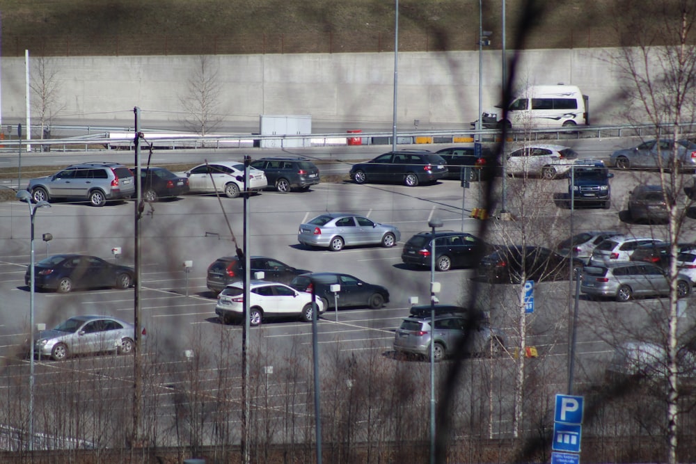 cars parked on parking lot during daytime