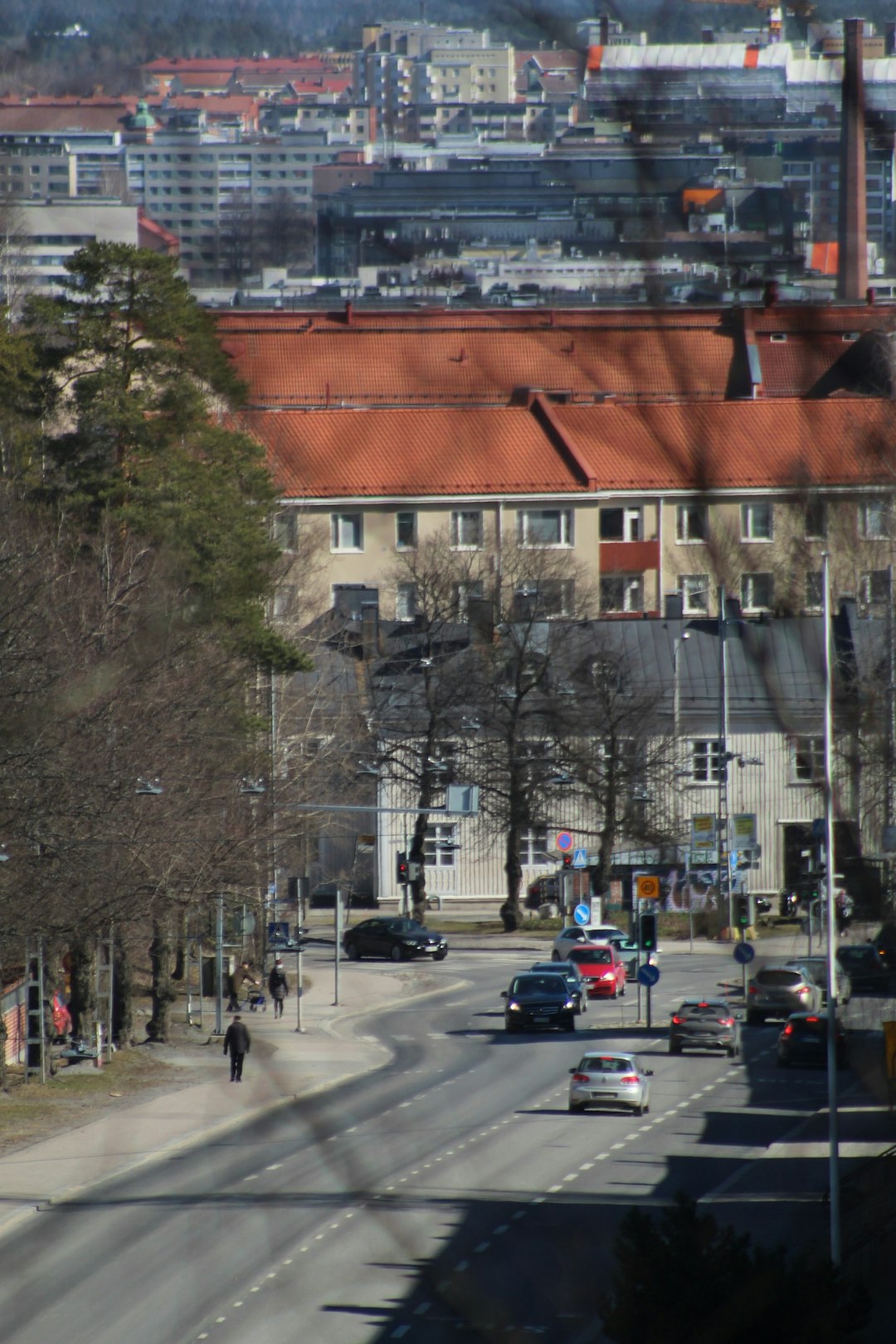 people walking on street near brown concrete building during daytime