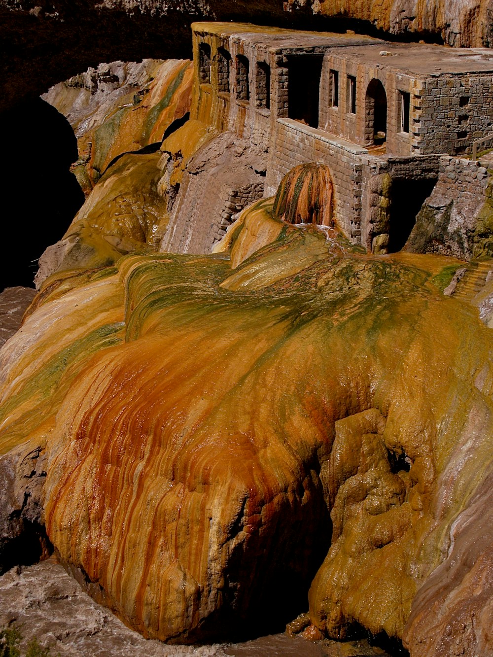 brown and green rock formation