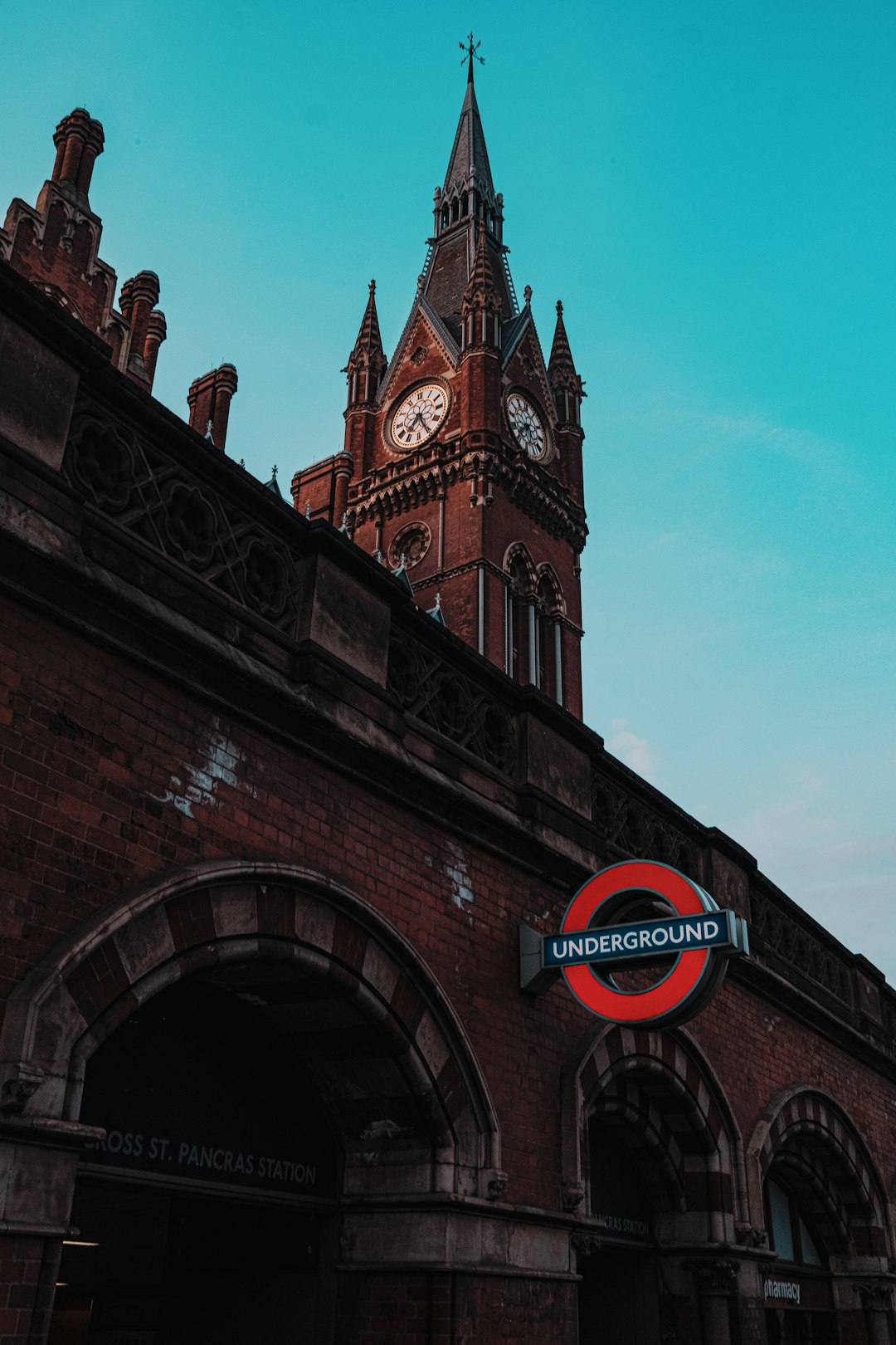 brown concrete building with clock tower