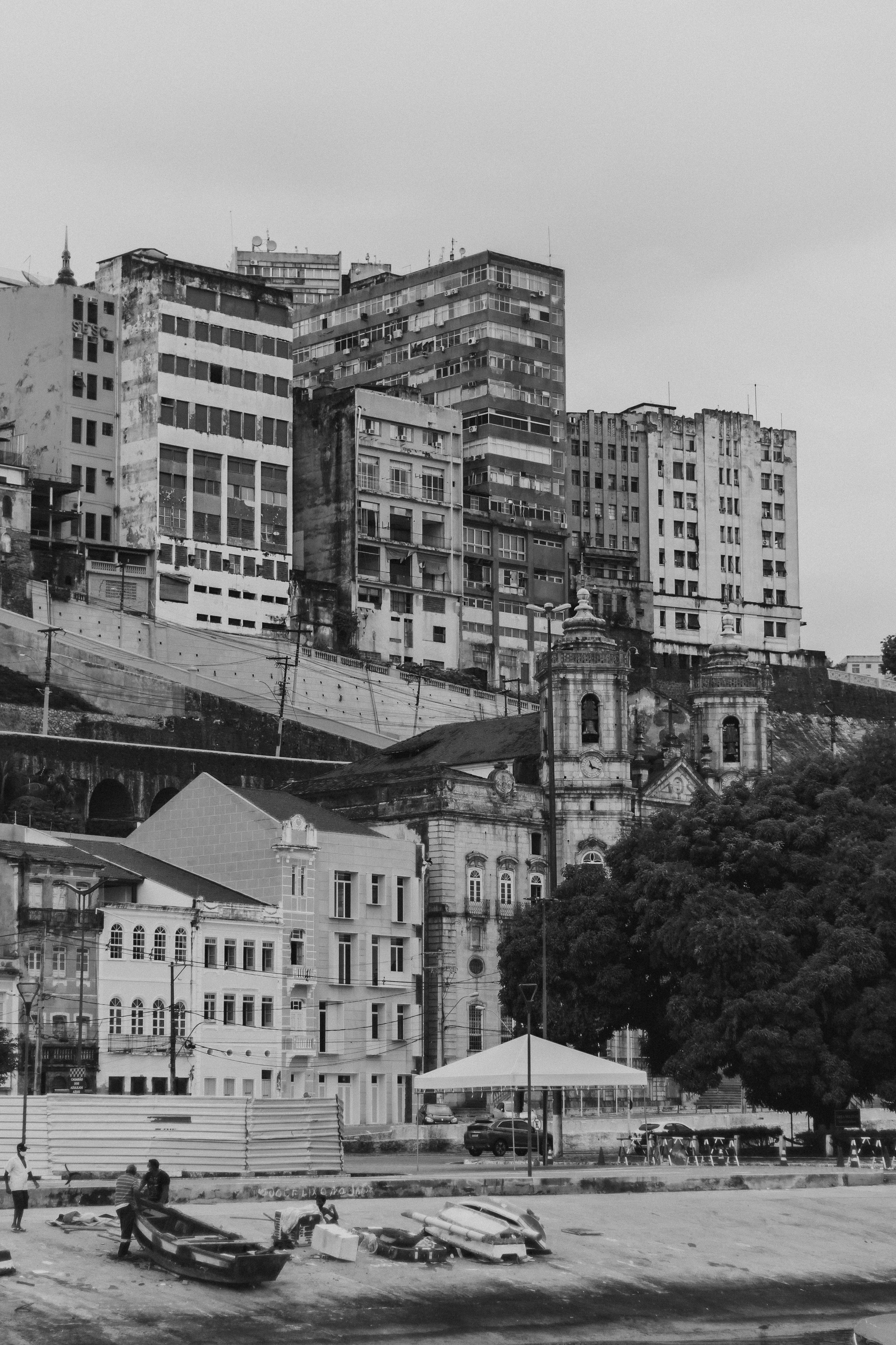 Grayscale photo of city buildings photo – Free Human Image on Unsplash
