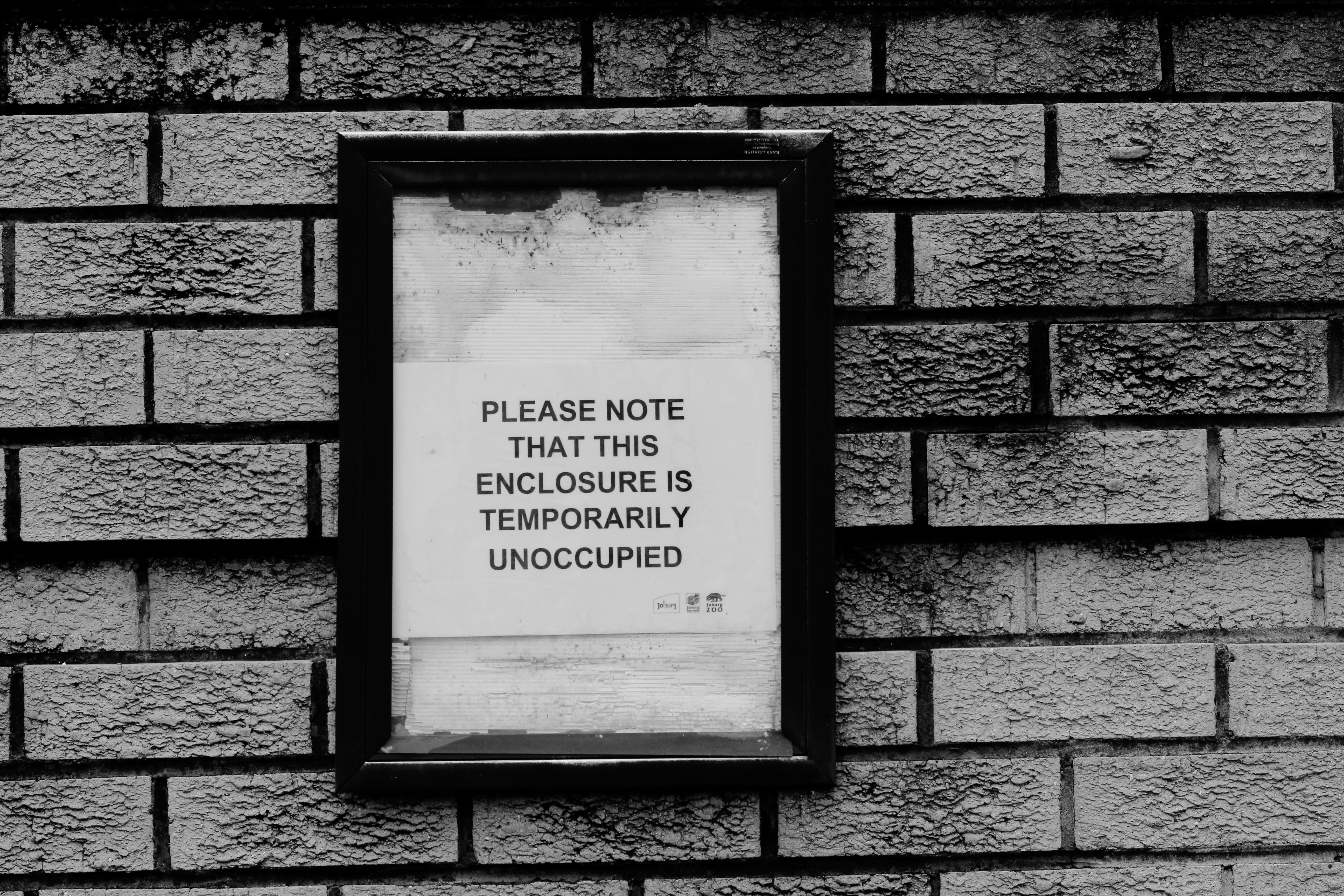 black wooden frame on brown brick wall (Photo by Hennie Stander on Unsplash)