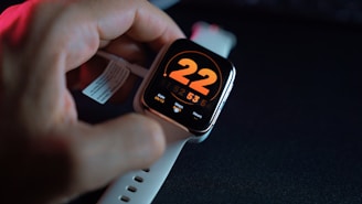 silver aluminum case apple watch with white sport band