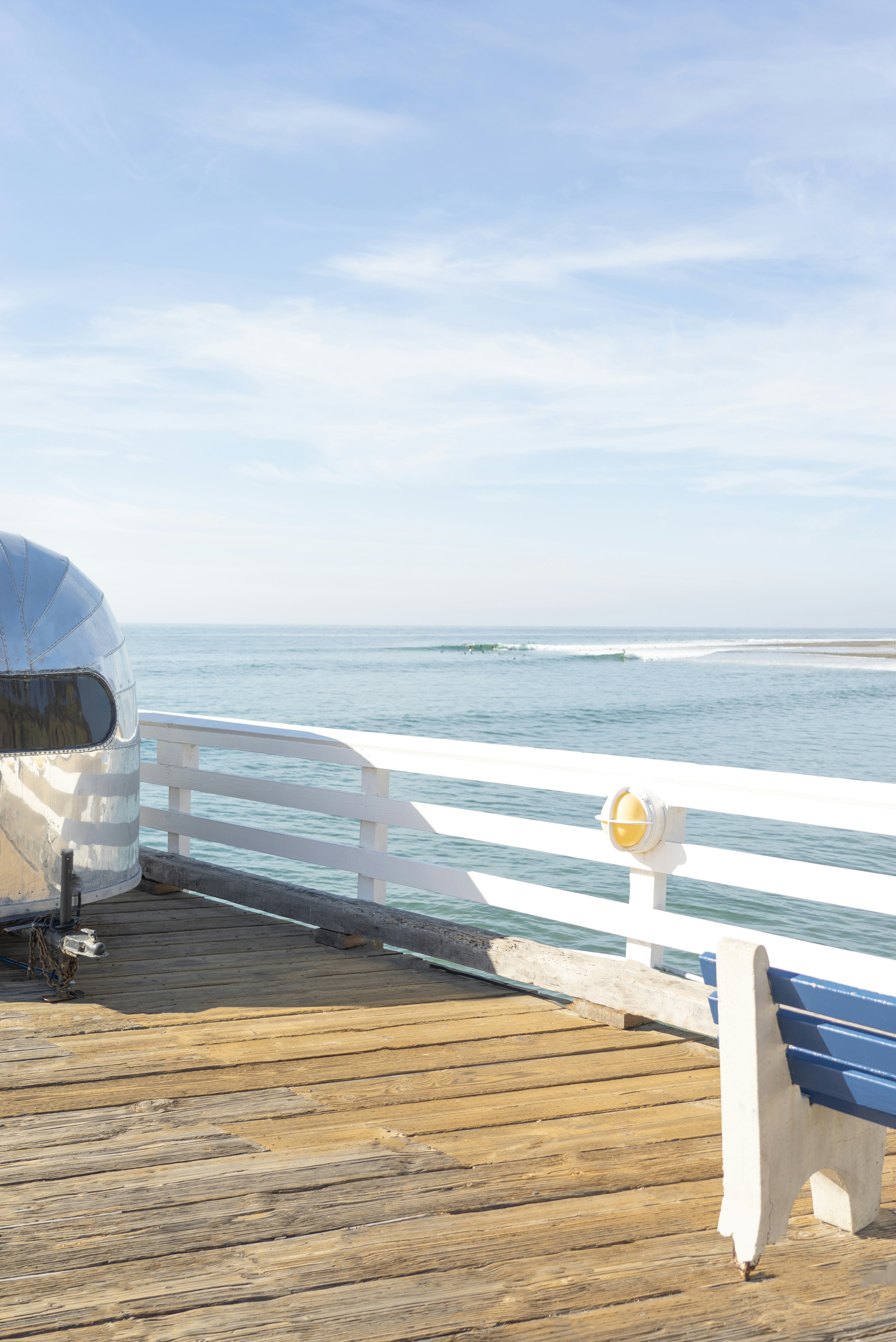 white and blue boat on sea during daytime