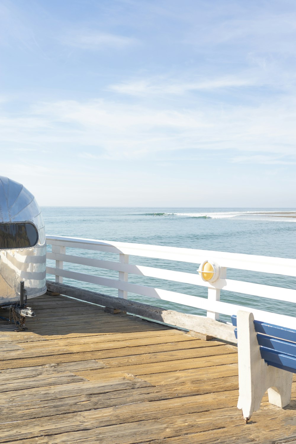 white and blue boat on sea during daytime