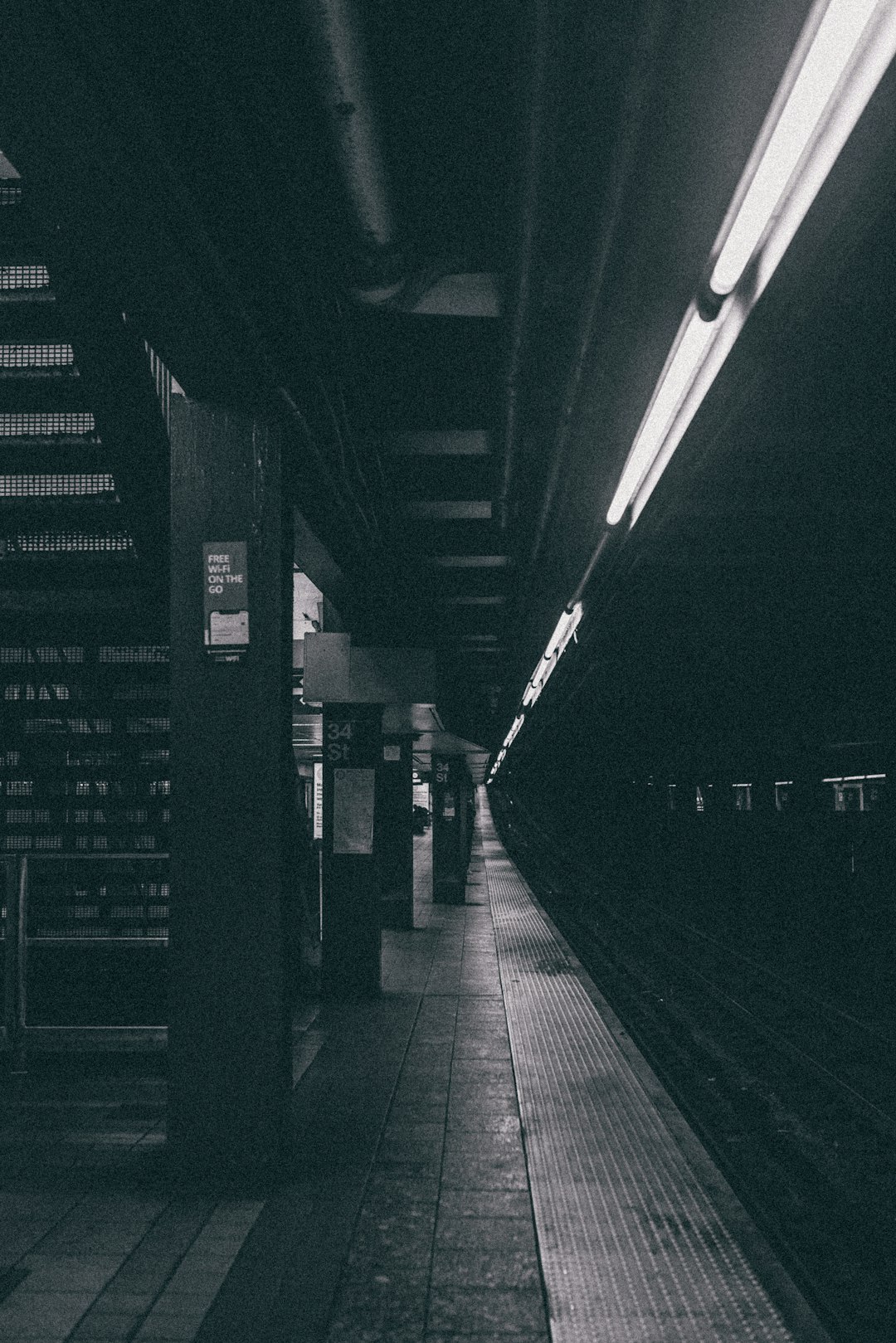 grayscale photo of a hallway