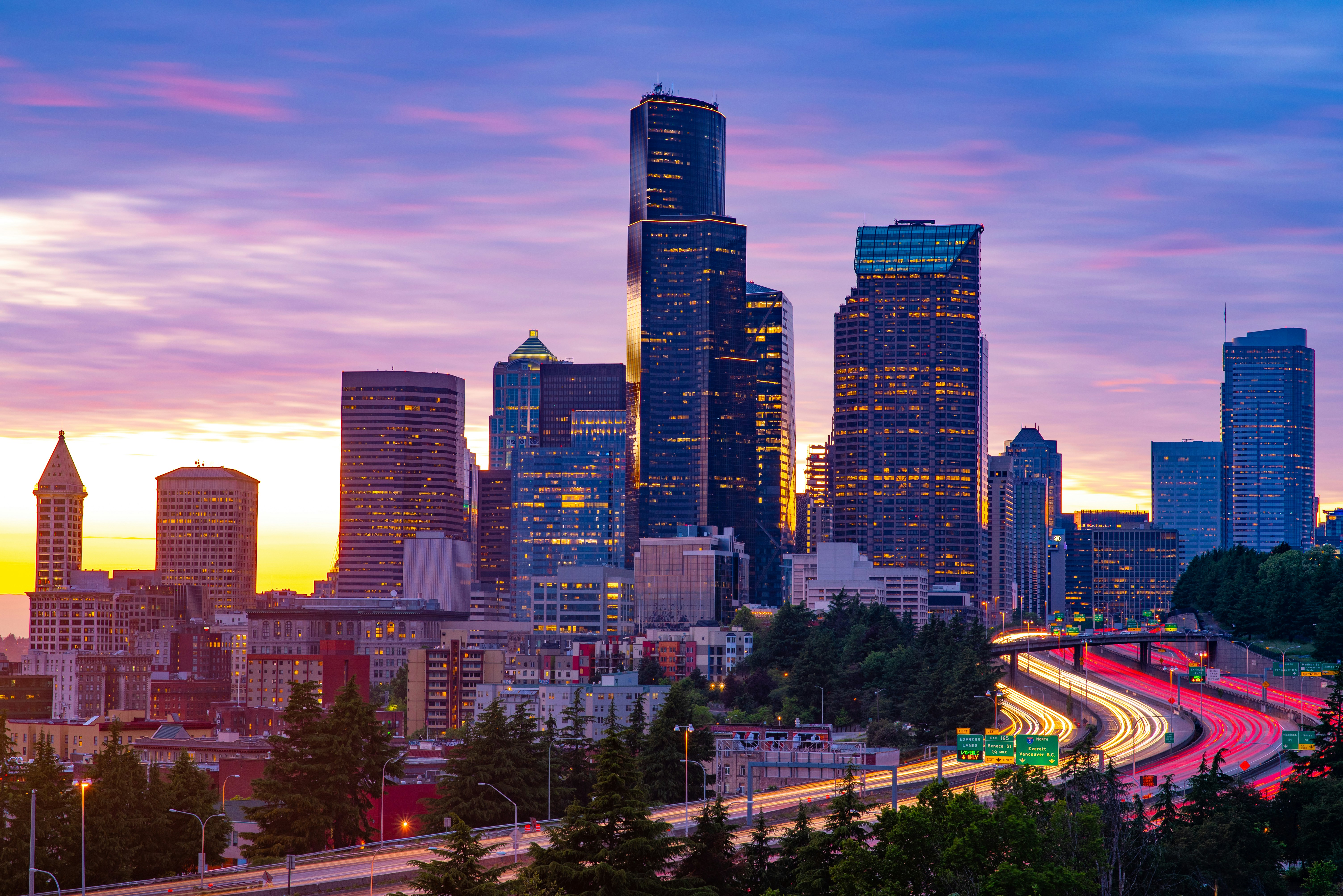 city buildings under blue sky during daytime, Seattle skyline at rush hour