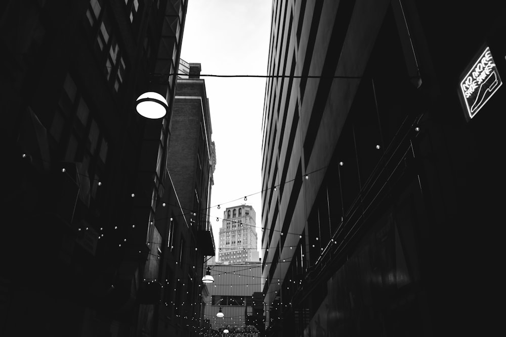 grayscale photo of city buildings