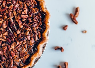 brown pie on white ceramic plate