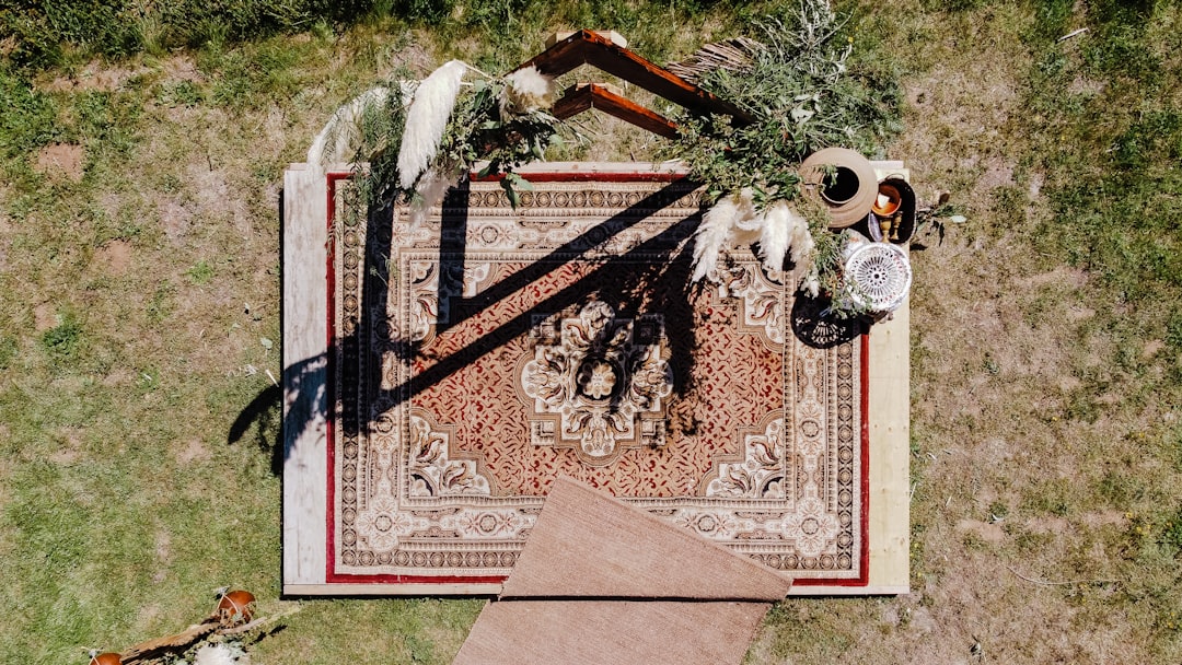 brown and black floral area rug