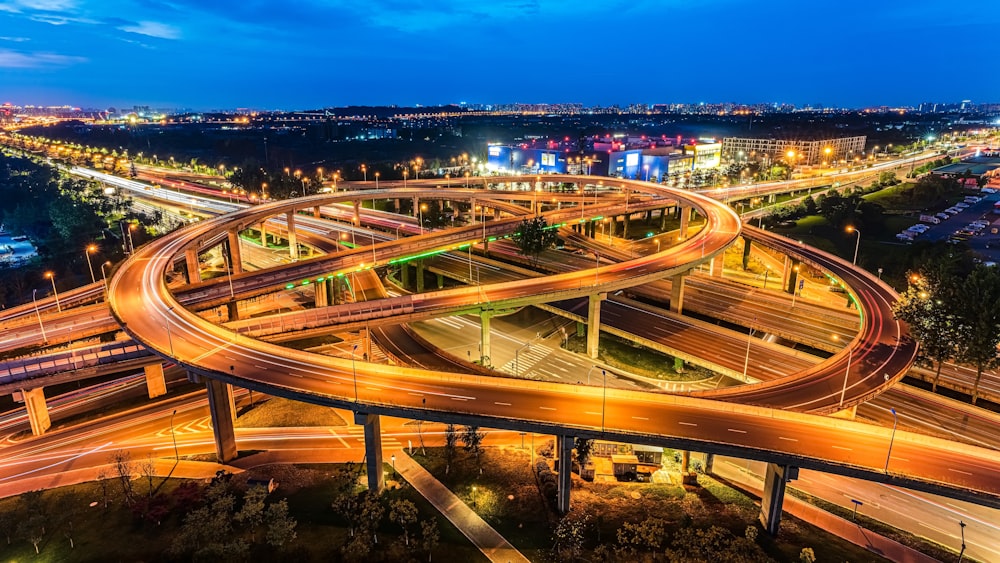 time lapse photography of cars on road during night time