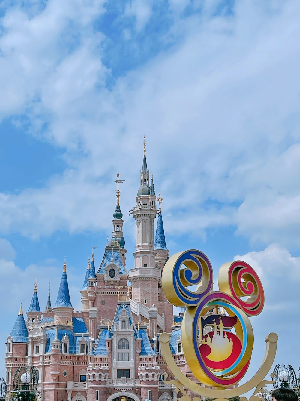 white and blue castle under blue sky